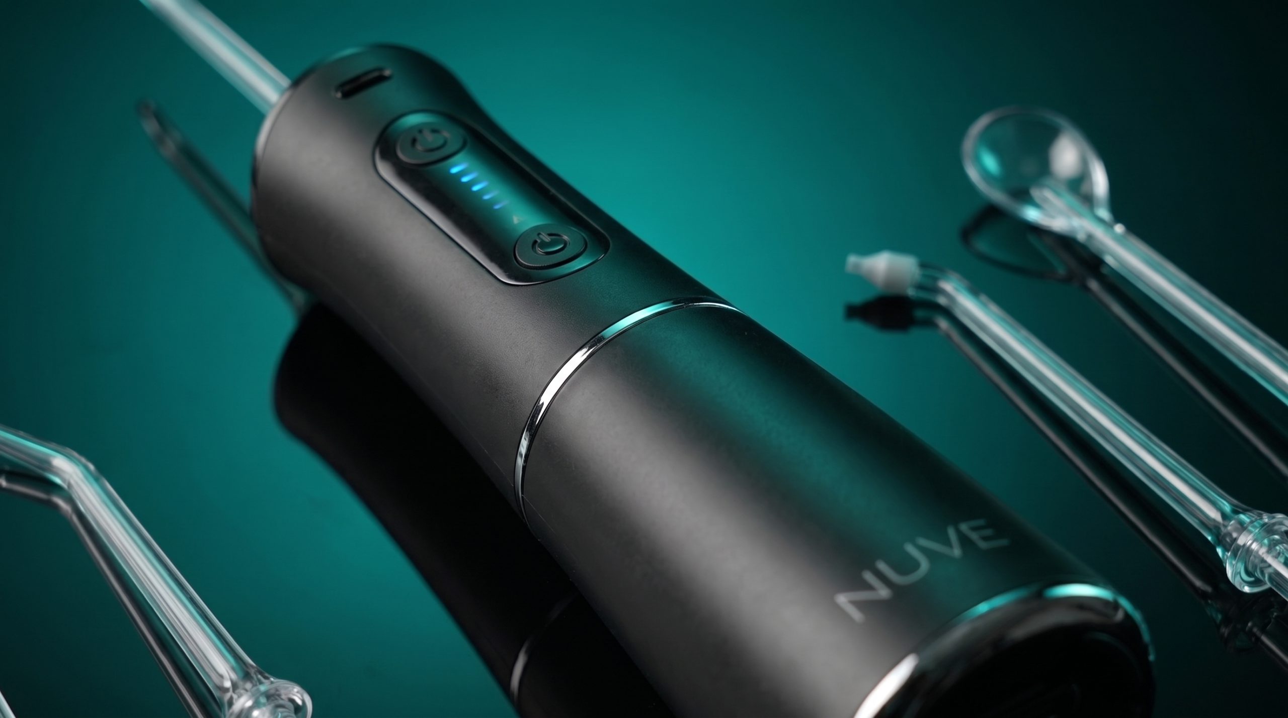 Close-up of Nuve Water Flosser pressure controls and battery indicator